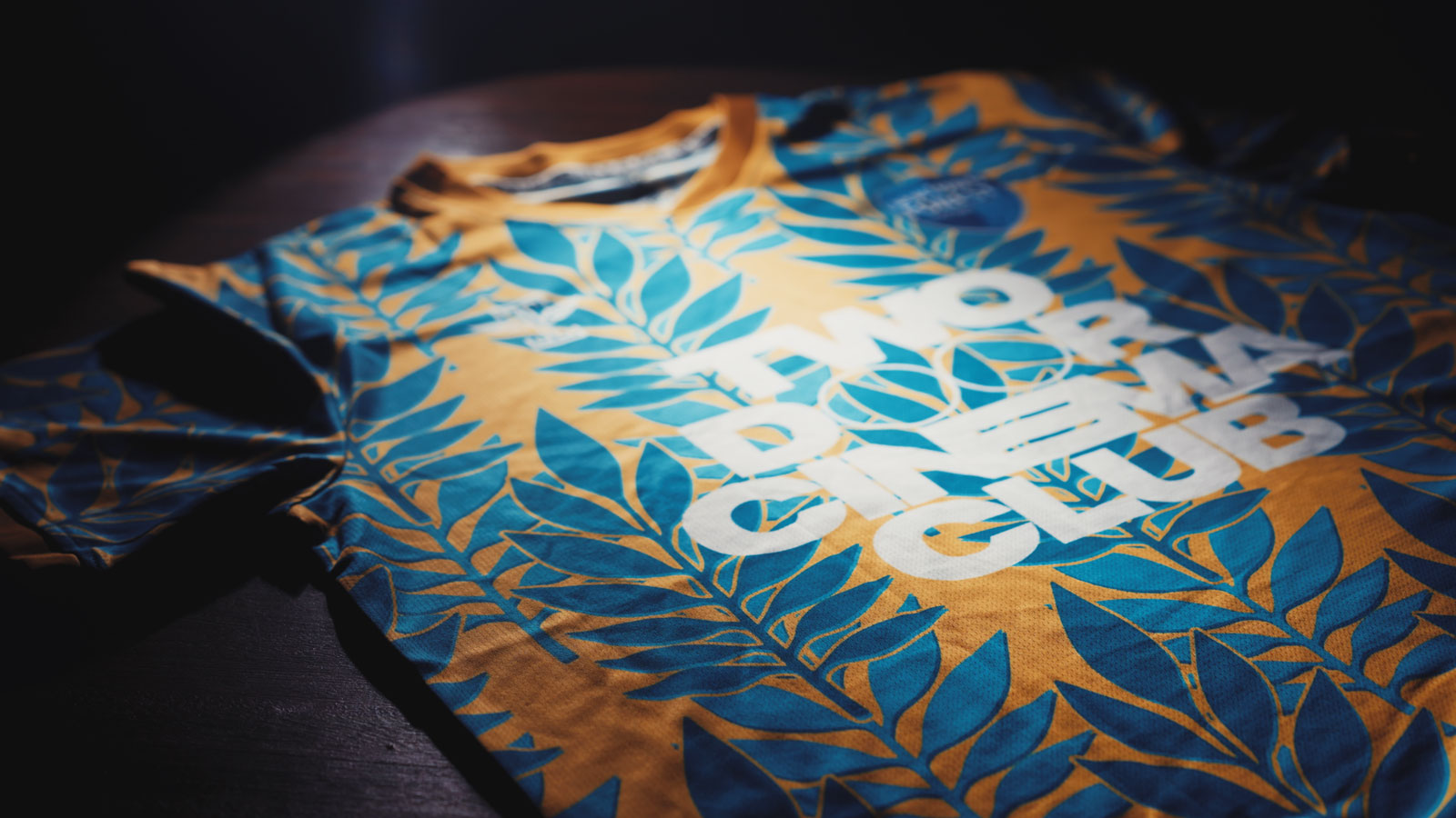 The shirt laid flat showing the full leaf pattern